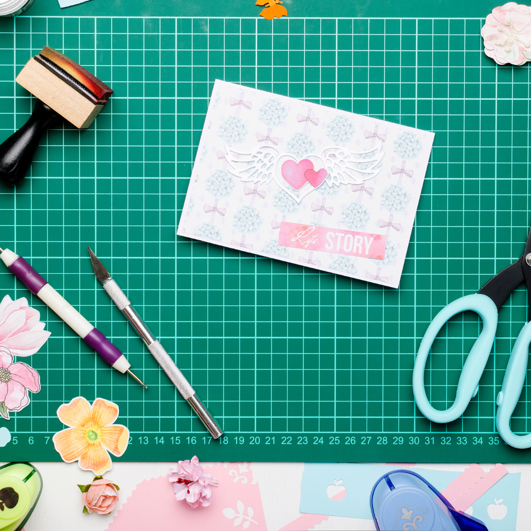 craft mat with scissors , stamp and pens
