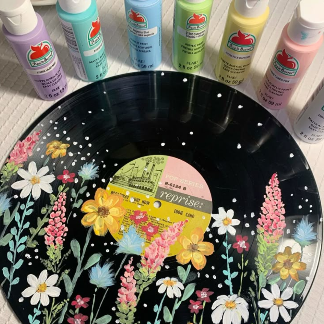painted flowers on a vinyl record