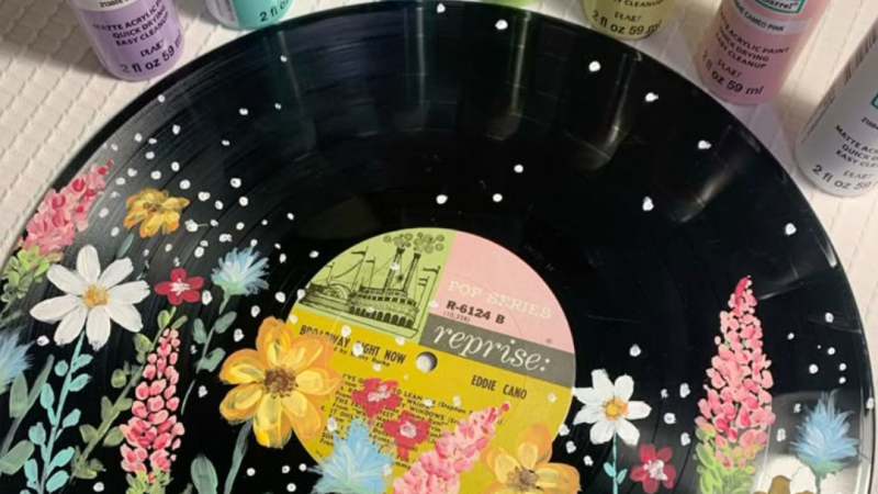 painted flowers on a vinyl record